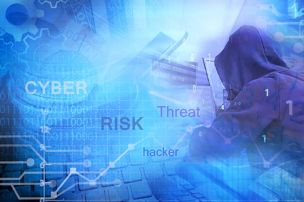 A compilation image of a hacker, zeroes and ones, a keyboard, and words like cyber, risk, threat, and hacker.